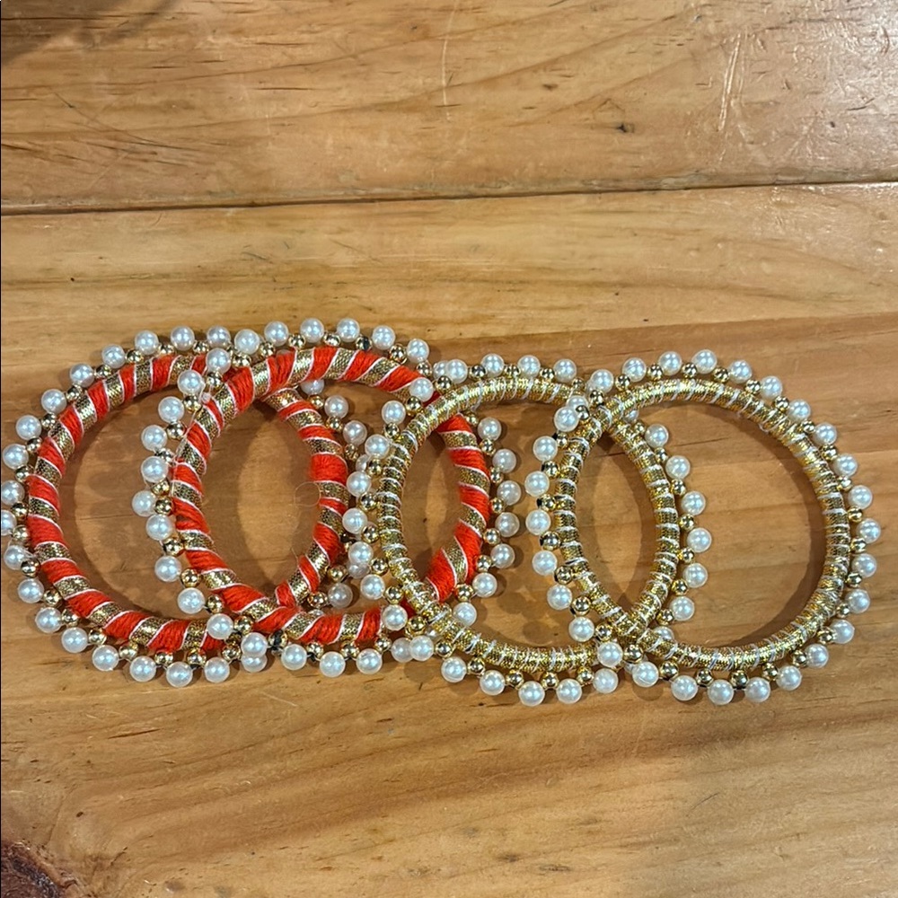 Elegant Gold and Orange Pearl Bangles